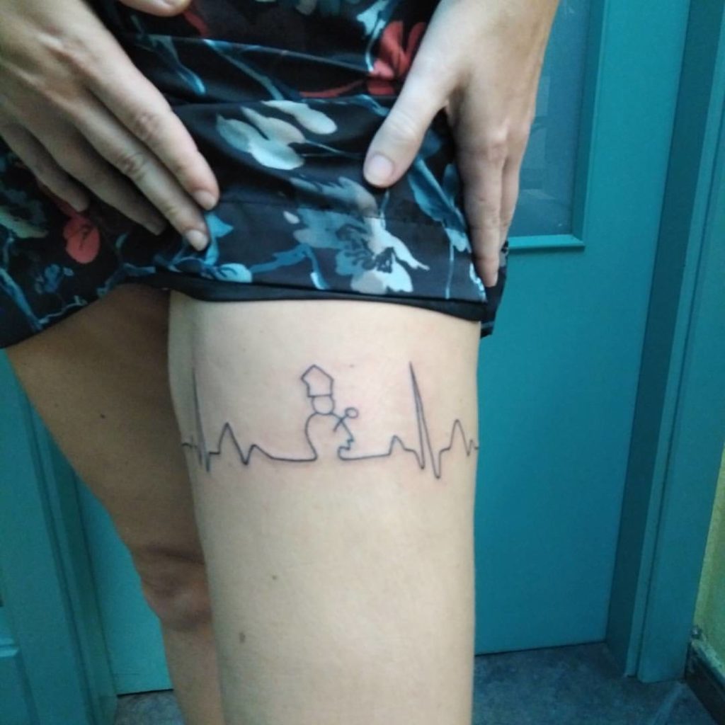 Tatto de San Fermi en la pierna, realizado por Gomi Tatto.